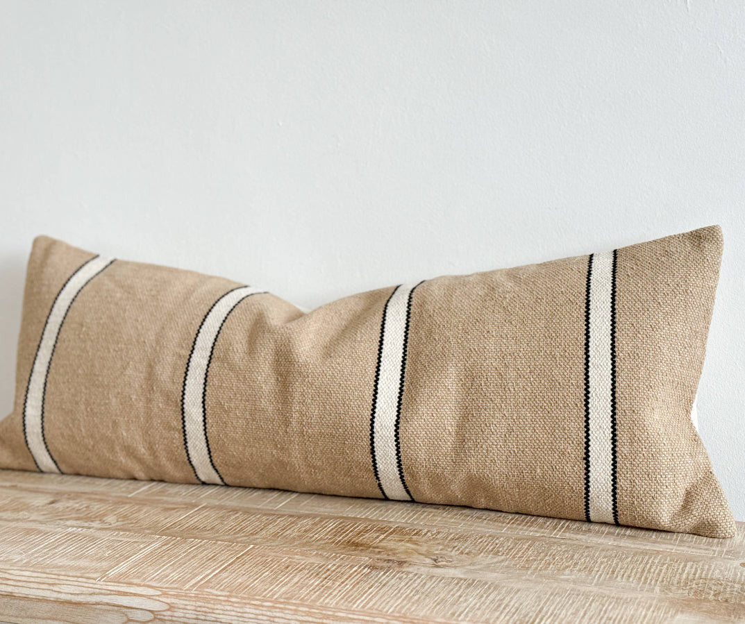 Textured thick cotton long Cushion in a neutral beige with a black and white stripe