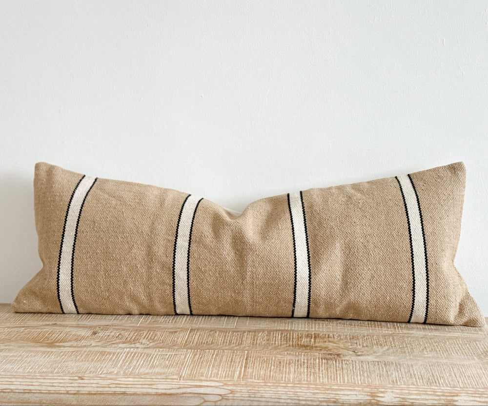 Textured thick cotton long Cushion in a neutral beige with a black and white stripe