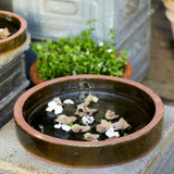 dark green glazed round bird bath 