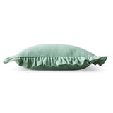 A mint green rectangular throw pillow with a ruffled fabric trim, shown against a plain white background.