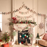 Decorated living room with Christmas decorations, including a 'Merry Christmas' banner and festive items around a fireplace.