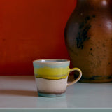 1970's Ceramic cup with yellow and blue stripes