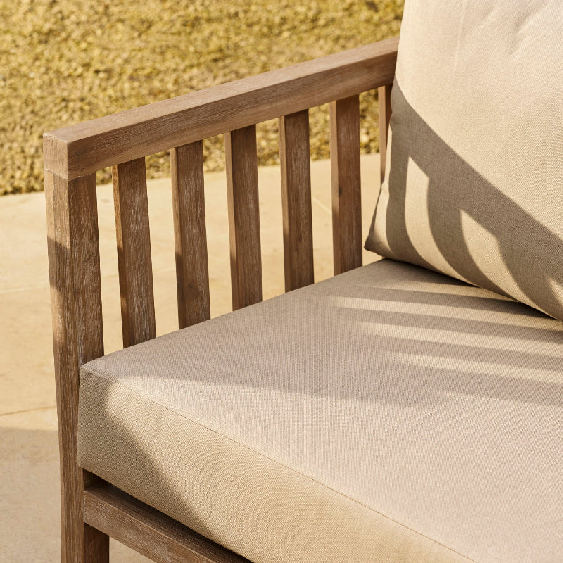 Porthallow outdoor sofa with beige cushions
