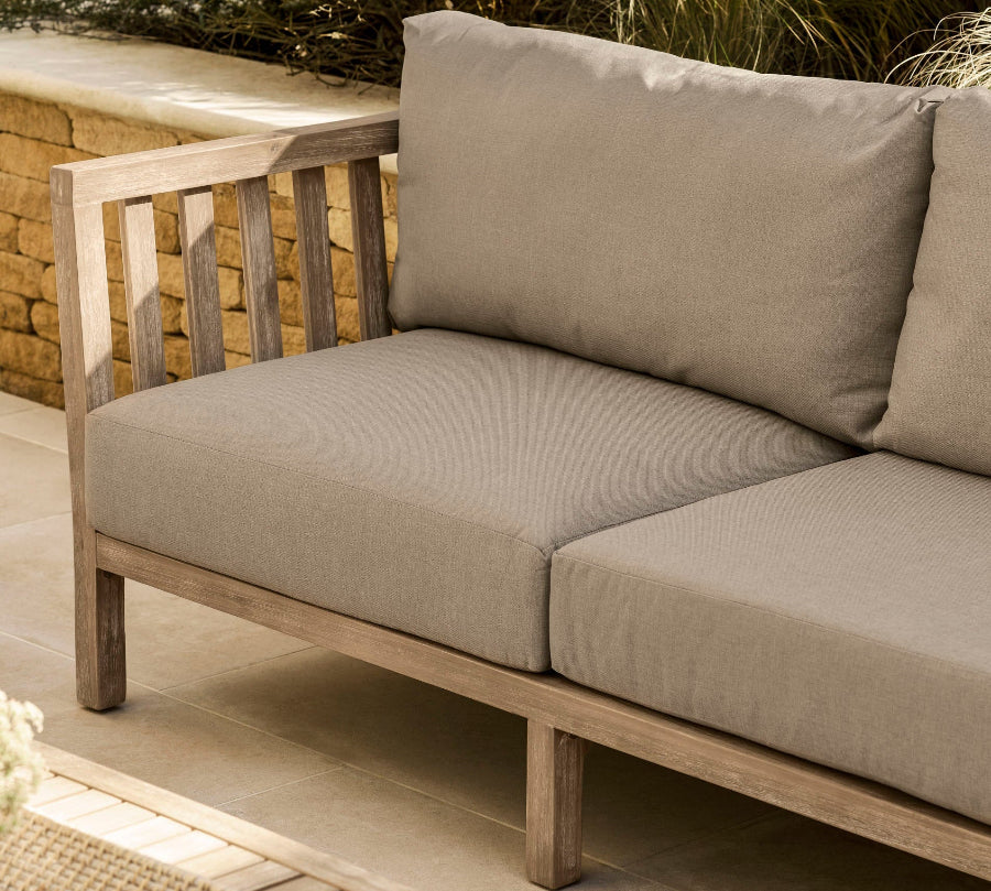 beige cushions on garden sofa 