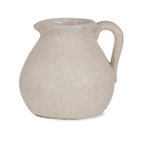 White ceramic pitcher on a white background