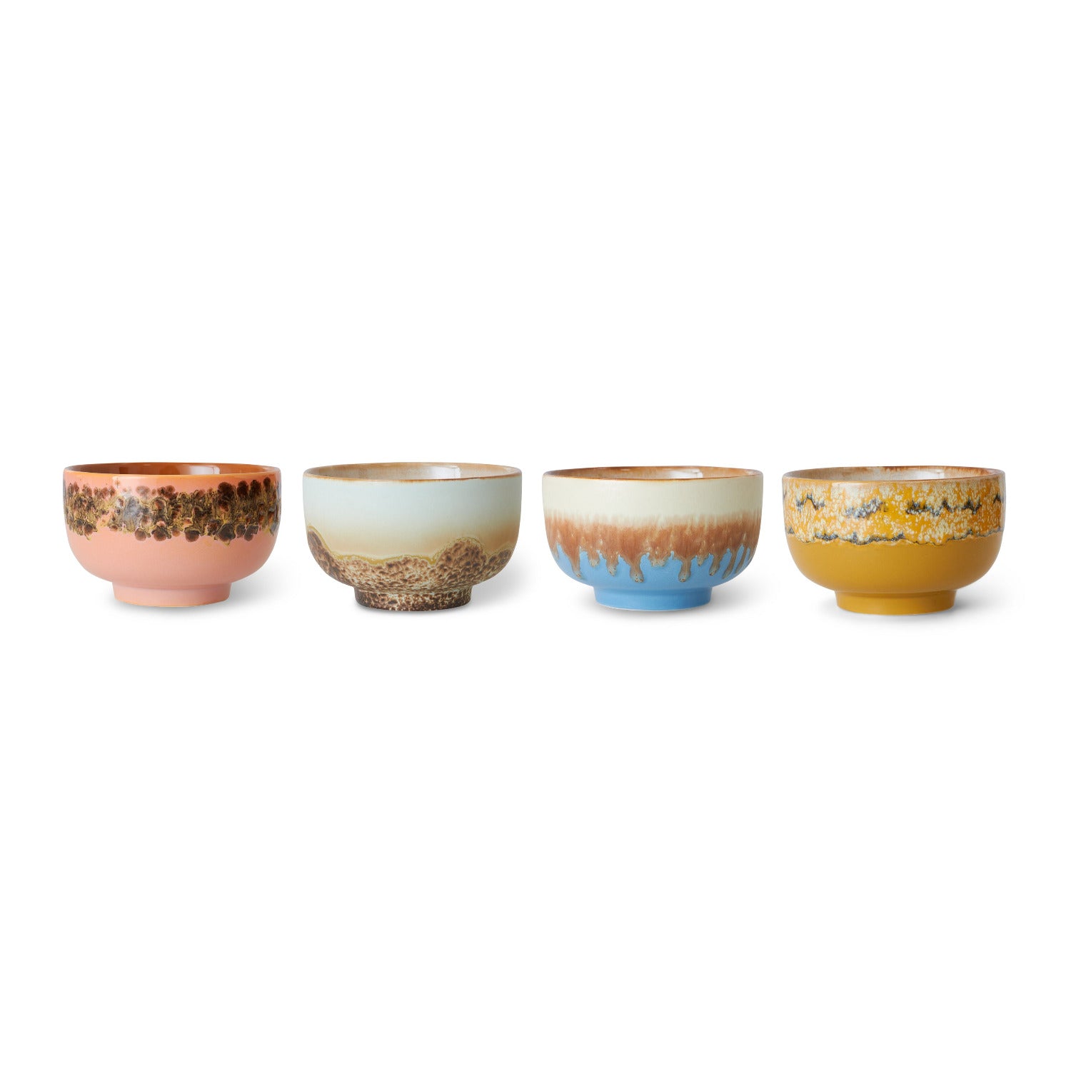 Set of four ceramic bowls with multicolored glaze on a white background
