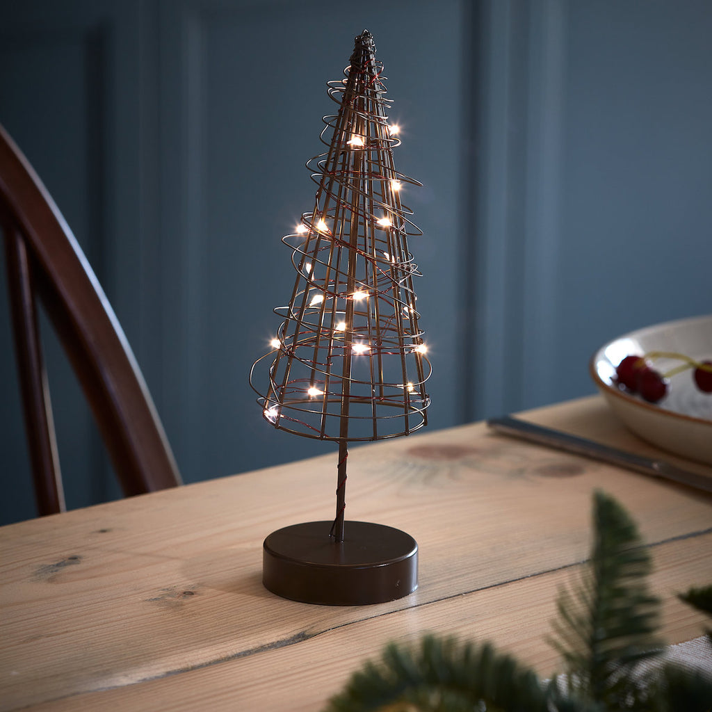 brown tabletop wire Christmas tree with LED lights