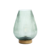 Green glass LED table lamp with gold base on a white background