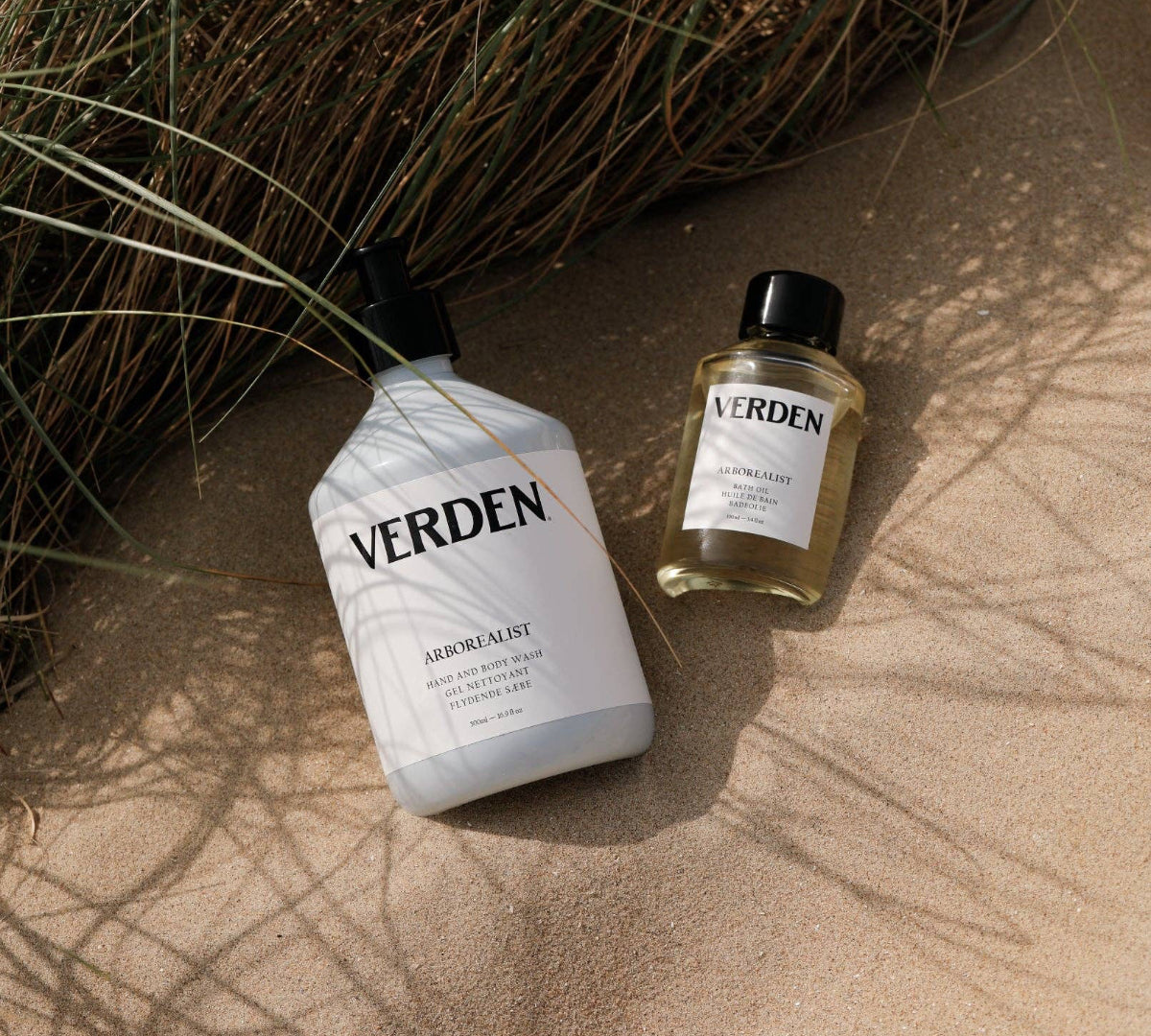 Two Verden Arborealist bottles of hand and body wash and bath oil