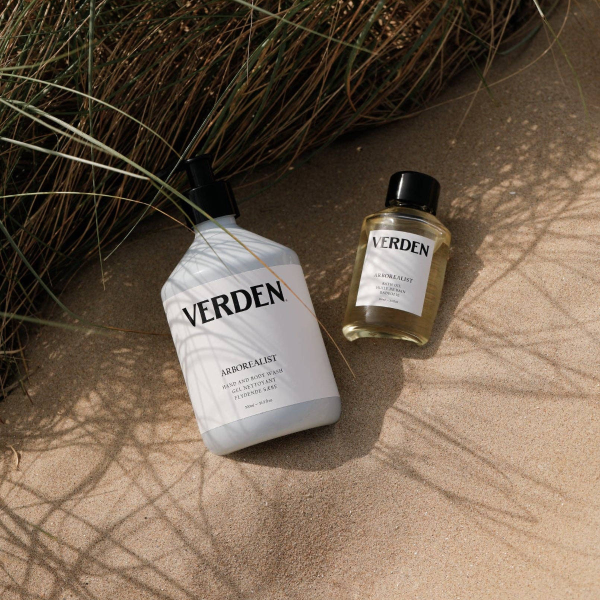 Two Verden Arborealist bottles of hand and body wash and bath oil