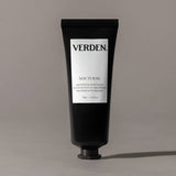 Black tube of Verden Nocturne balm on a gray background