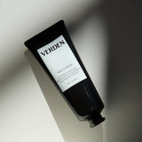 Black tube of Verden Nocturne magnesium skincare product on a light background