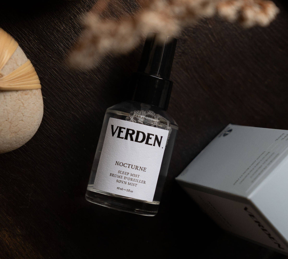 Verden Nocturne sleep mist bottle on a dark surface with decorative elements.