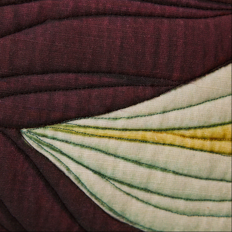 Close-up of textured fabric with a floral pattern