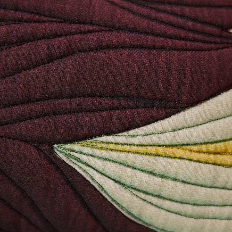 Close-up of textured fabric with a floral pattern