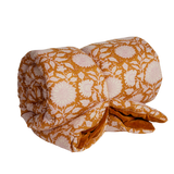 Folded fabric with floral pattern on a white background
