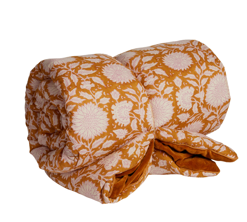 Folded fabric with floral pattern on a white background