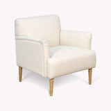 An upholstered armchair with cream fabric and tapered light wood legs, shown on a plain light gray background.