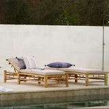 bamboo sun loungers with sand cushion