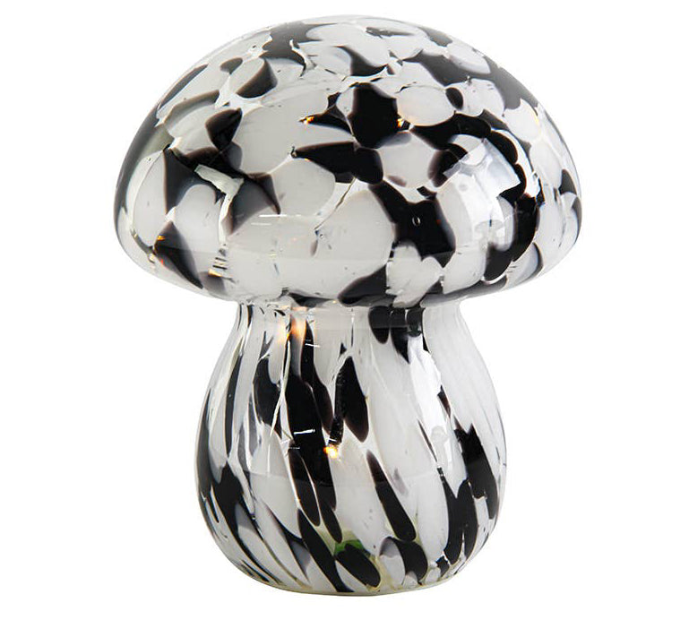 Black and white mushroom-shaped lamp on a white background