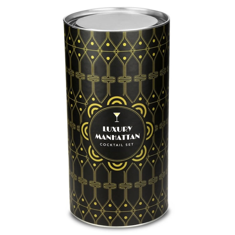 A cylindrical metal tin for a 'Luxury Manhattan Cocktail Set' featuring a black and gold Art Deco pattern, shown on a plain white background.