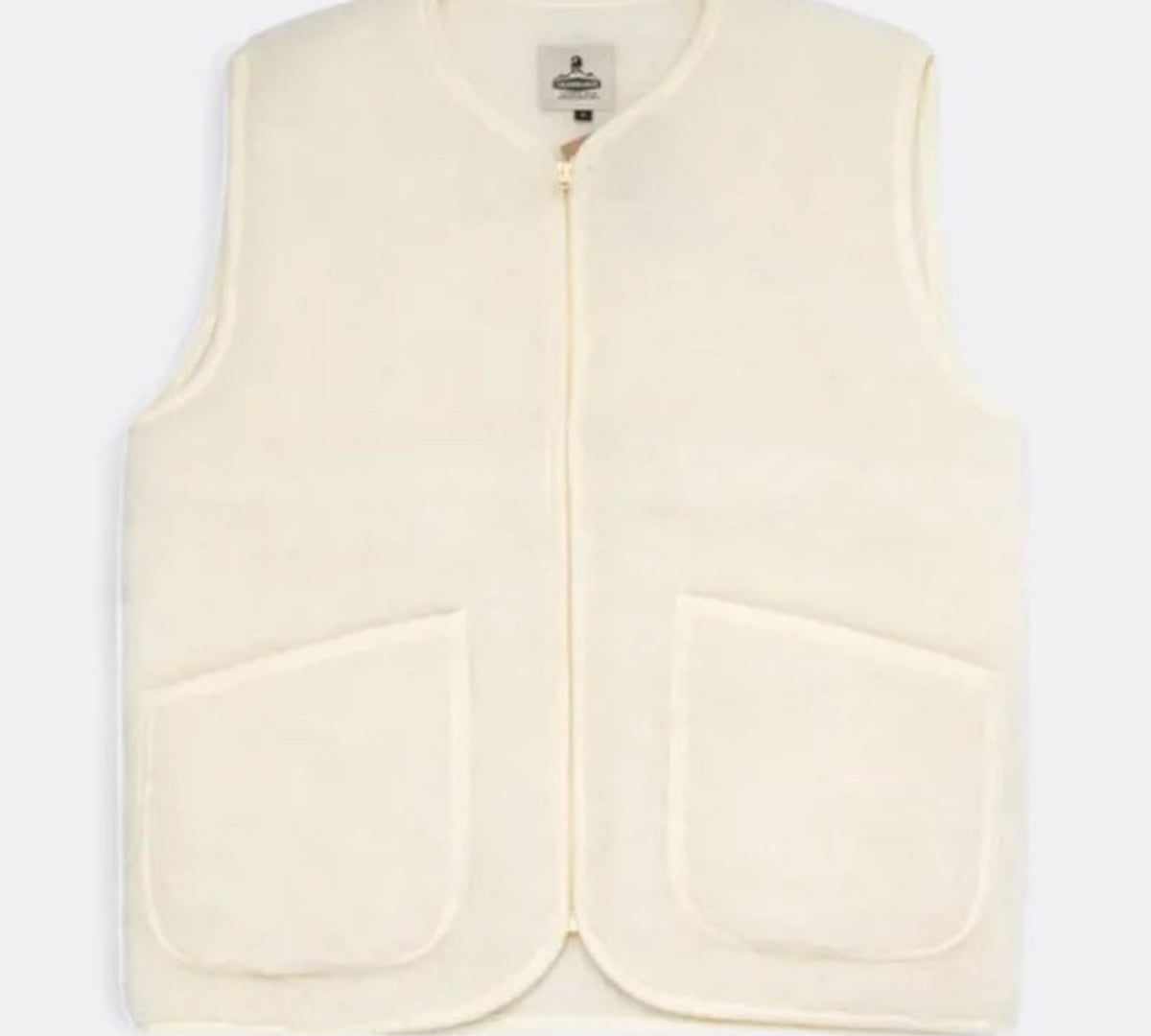 Cream-colored vest on a white background