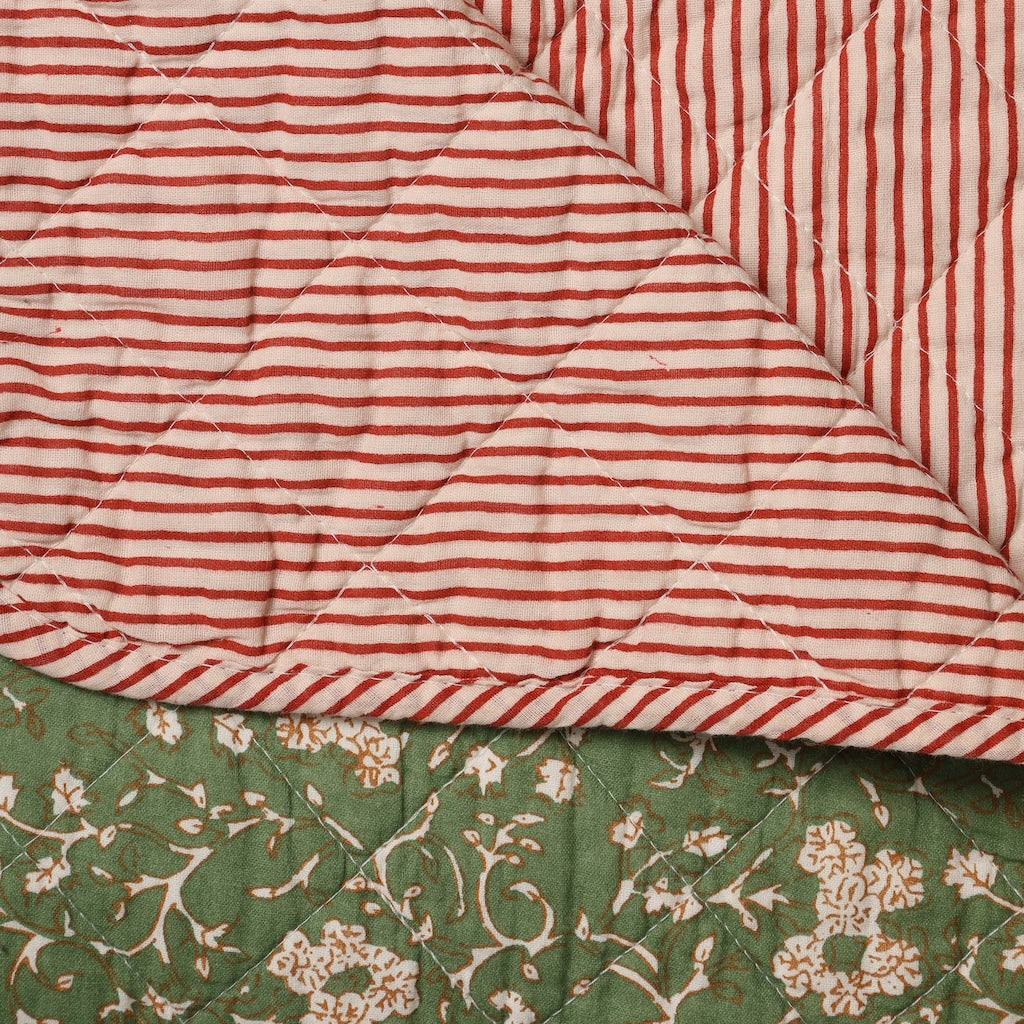 green floral quilt 