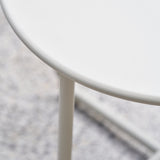 detail of metal coffee table in putty