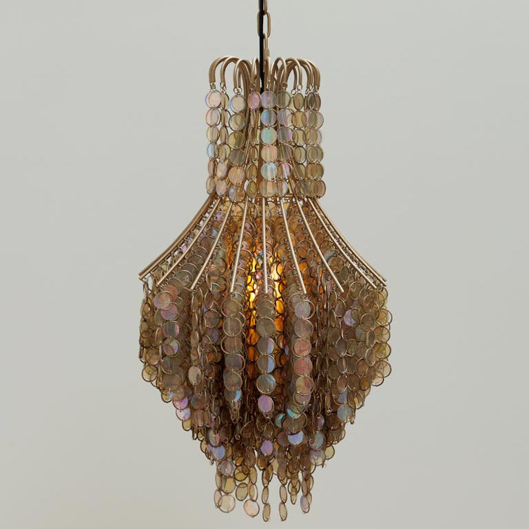 Decorative pendant light with beaded design on a plain background