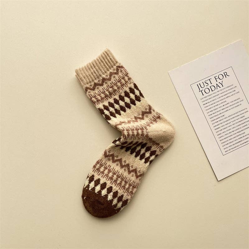 Knitted sock with a pattern on a beige background