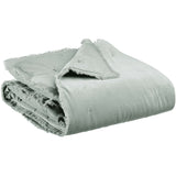 A folded light grey blanket with frayed edges, shown on a plain white background.