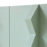 Close-up of a light green wall with geometric design