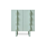 A modern two-door cabinet in a pale blue finish, featuring sculptural, stepped geometric handles and matching feet, shown against a plain white background.