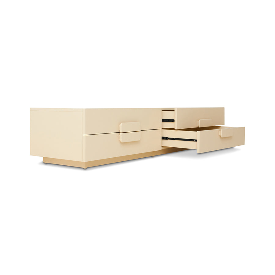 Beige dresser with open drawer on a white background