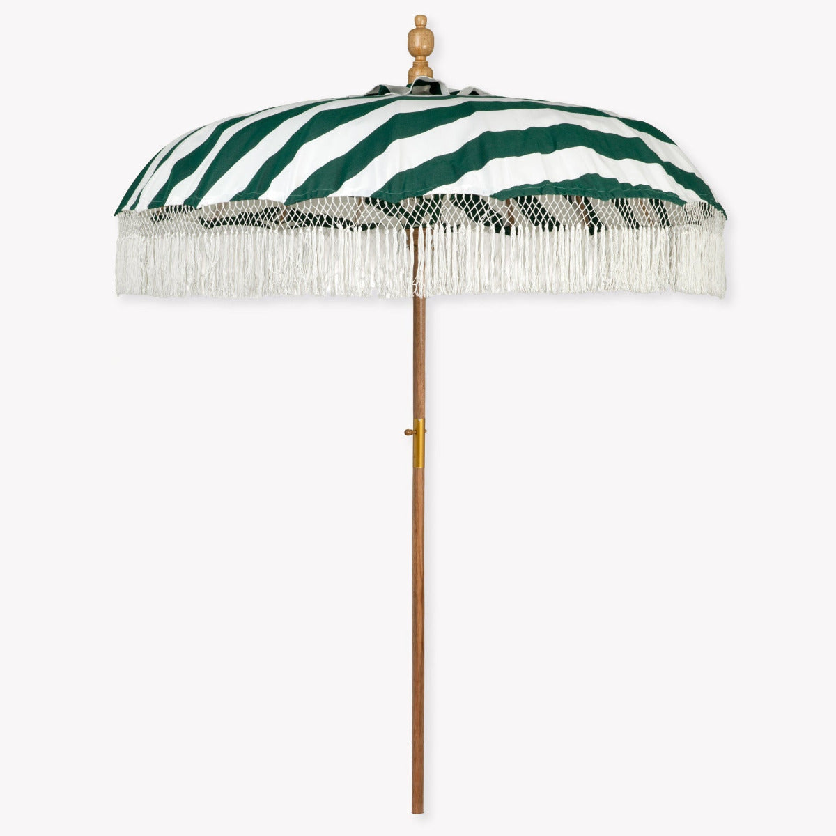 A green and white striped sun umbrella with white fringe trim and a light wood pole, shown against a plain white background.