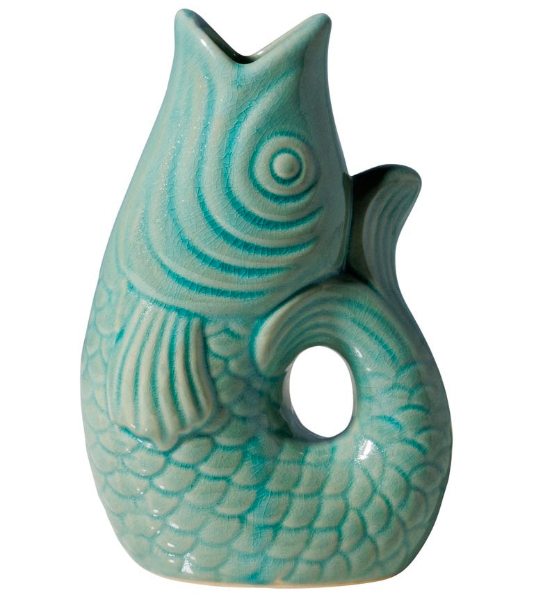 Turquoise ceramic fish-shaped vase on a white background
