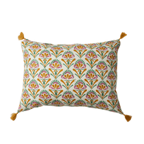 Decorative pillow with a colorful geometric pattern on a white background