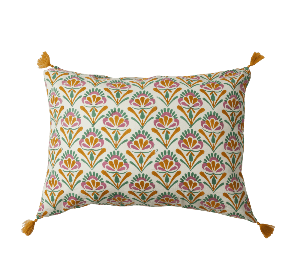 Decorative pillow with a colorful geometric pattern on a white background