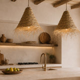 Kitchen with woven pendant lights, wooden shelves, and a modern faucet.
