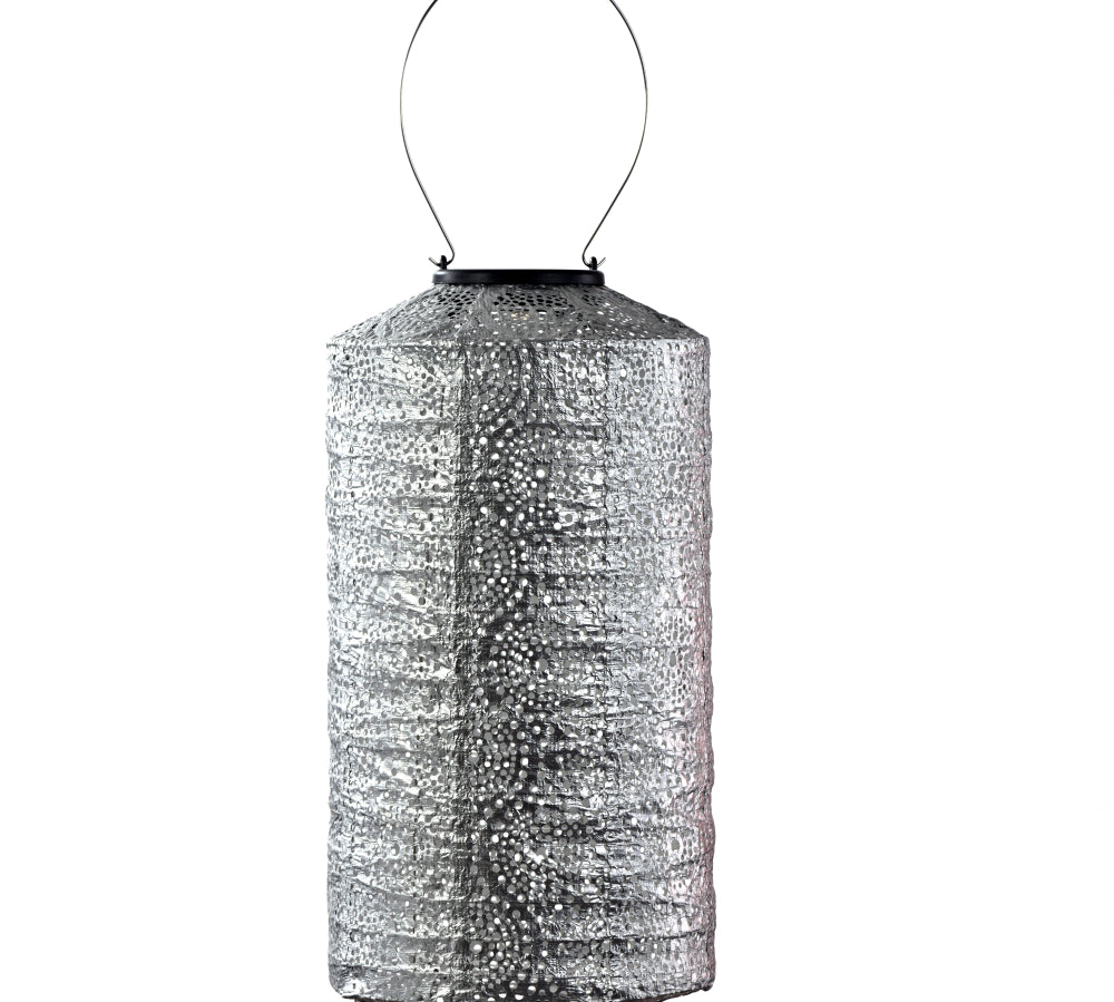 Decorative silver lantern with a white background