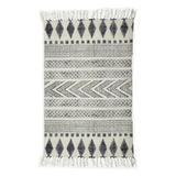 Geometric black and white patterned rug by House Doctor