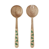 Wooden salad servers with decorative handles on a white background