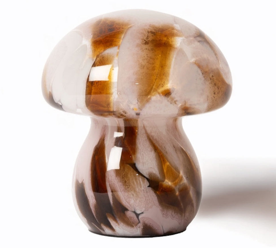 Mushroom-shaped glass lamp with brown and clear patterns on a white background