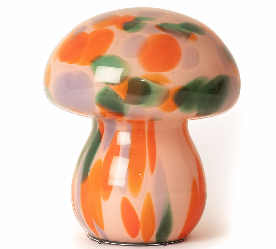 Colorful mushroom-shaped table lamp on a white background