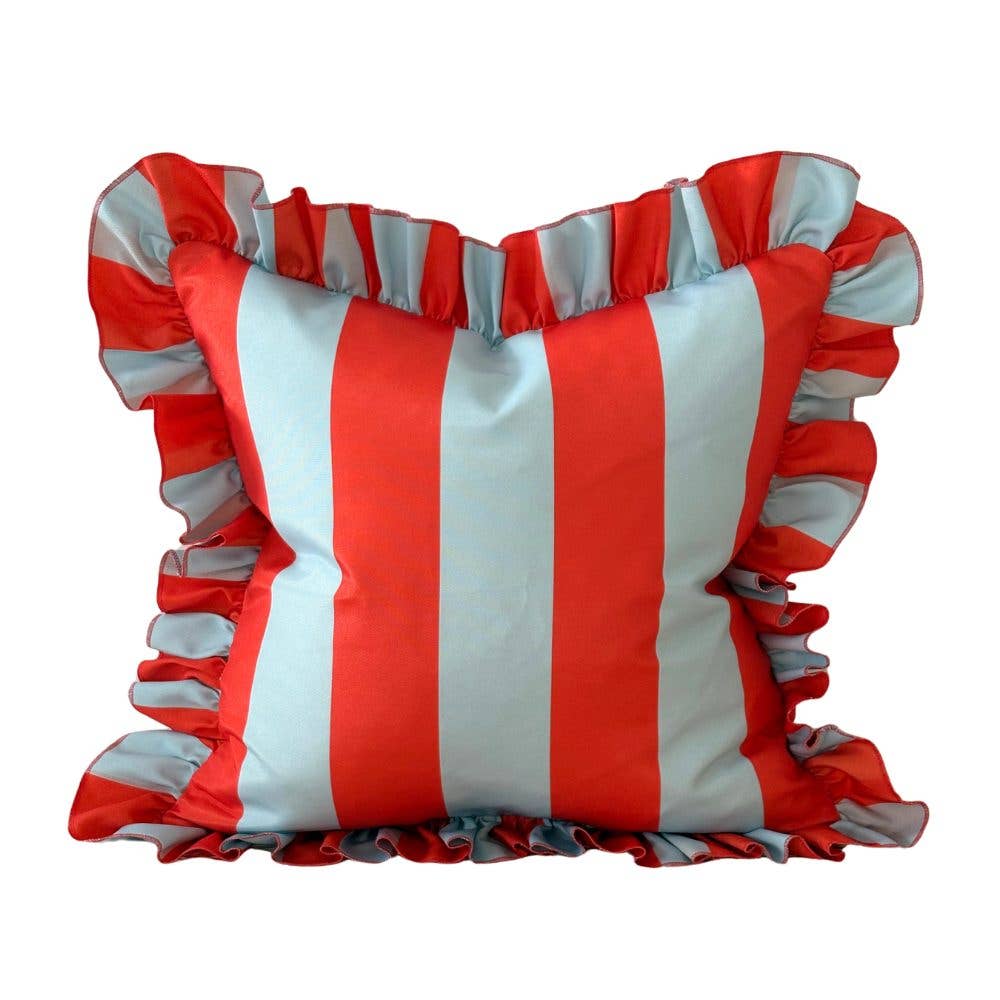Striped pillow with ruffled edges in red and white on a white background