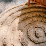 round woollen rug with concentric ring design