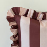 Striped fabric with red and pink colors on a light background