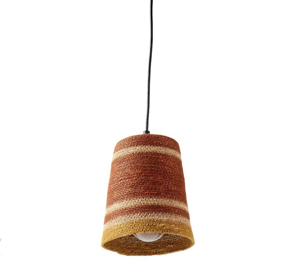 A woven cone-shaped pendant lampshade in terracotta, rust, and beige stripes, suspended by a black cord against a plain white background.