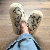 fluffy white slippers by Yoko
