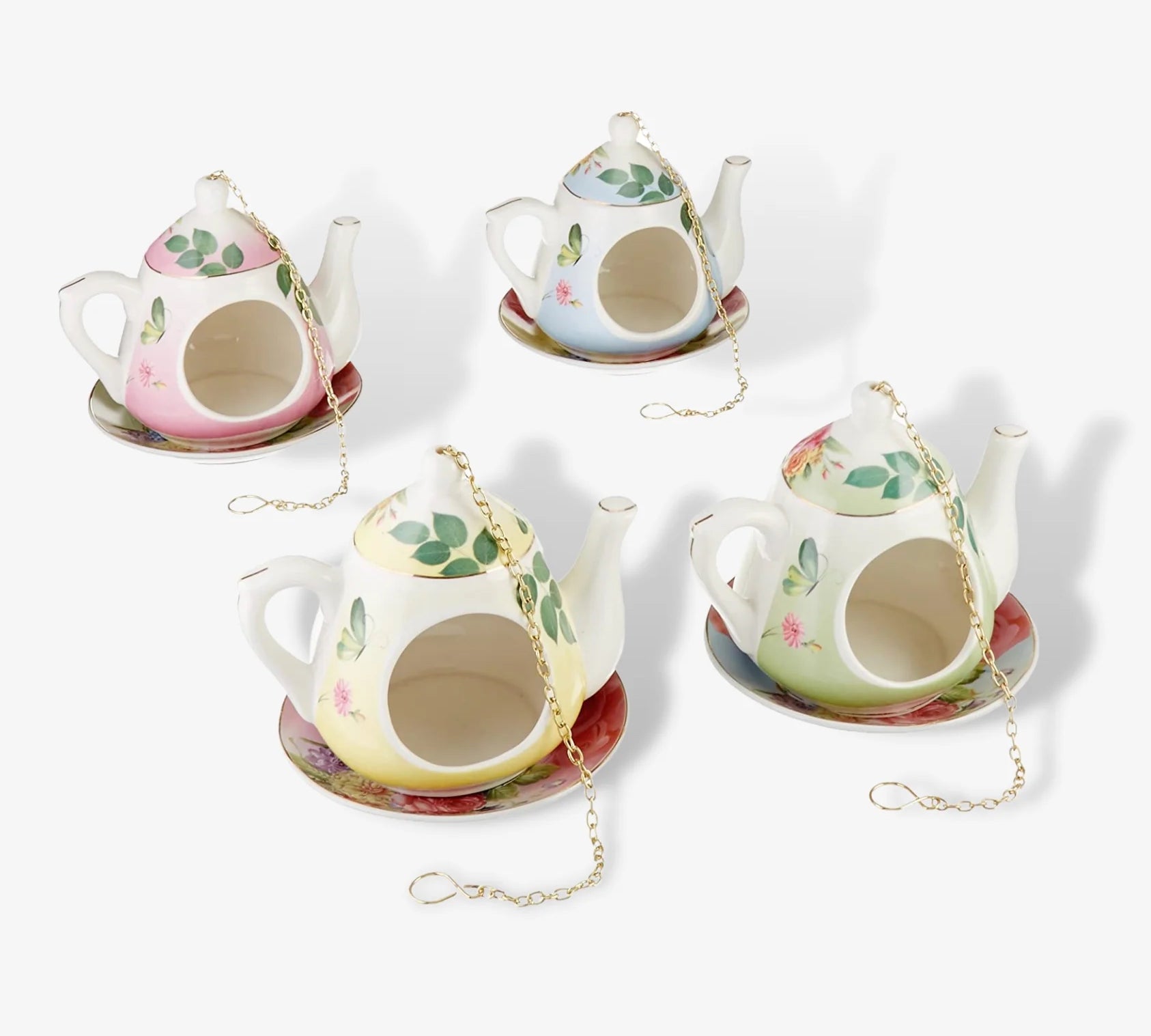 ceramic teapot bird feeder by Fallen Fruits